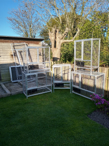 FIVE BREEDING CAGES